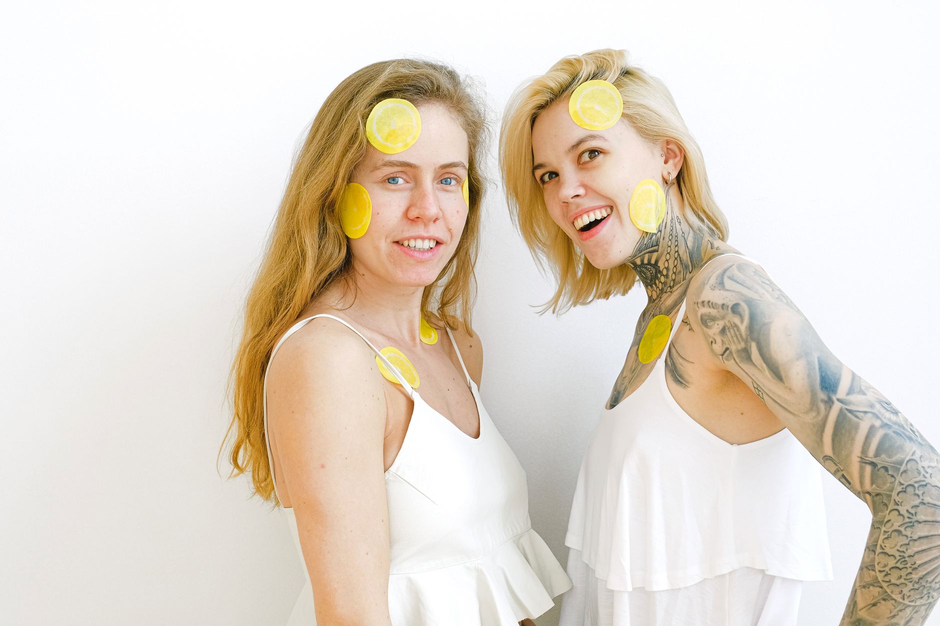 Bright lemons on a yellow background representing fresh sensation and vitality
