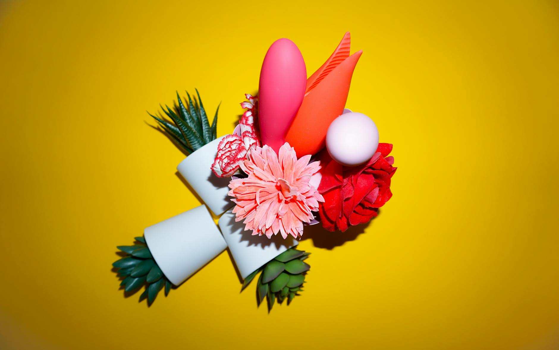 Ripe vivid lemons on a bright yellow background in a modern studio setting